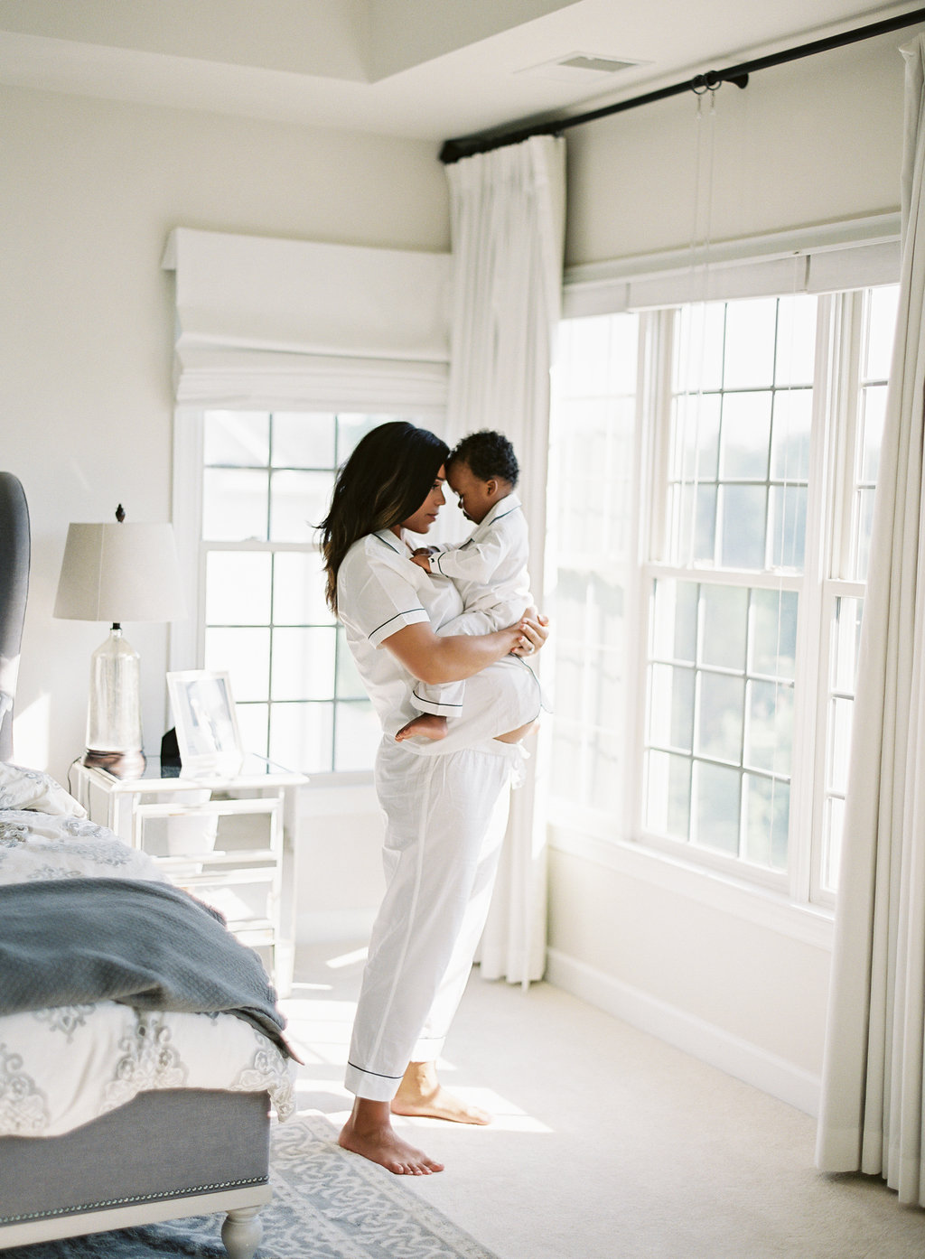 light and airy maternity photos with pregnant mother and son 