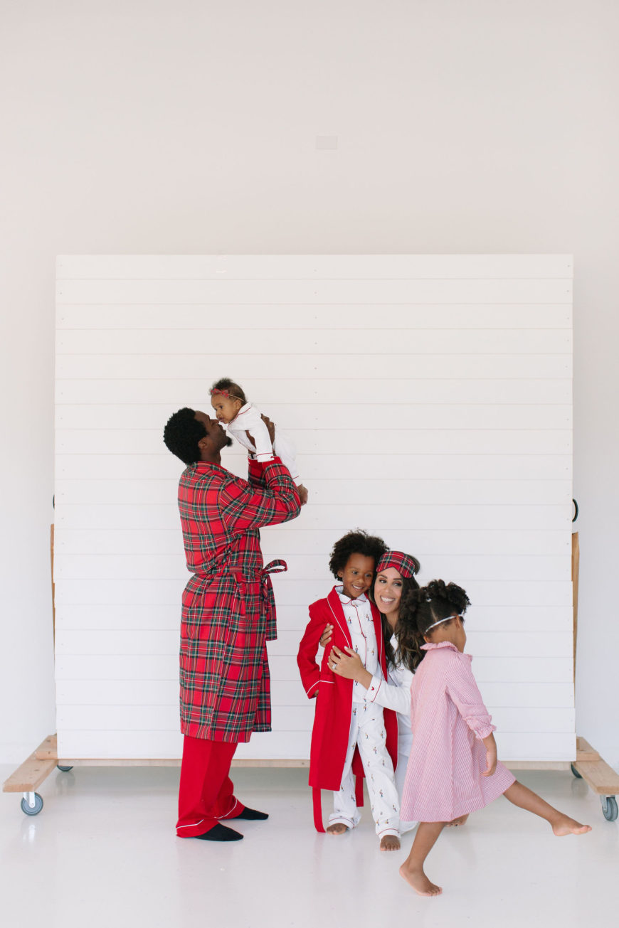 family photo in coordinating Christmas pajamas